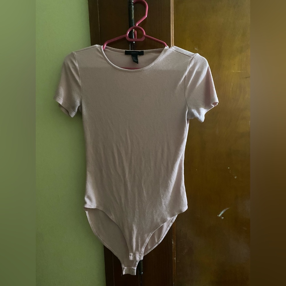 A pink bodysuit!! Size Small